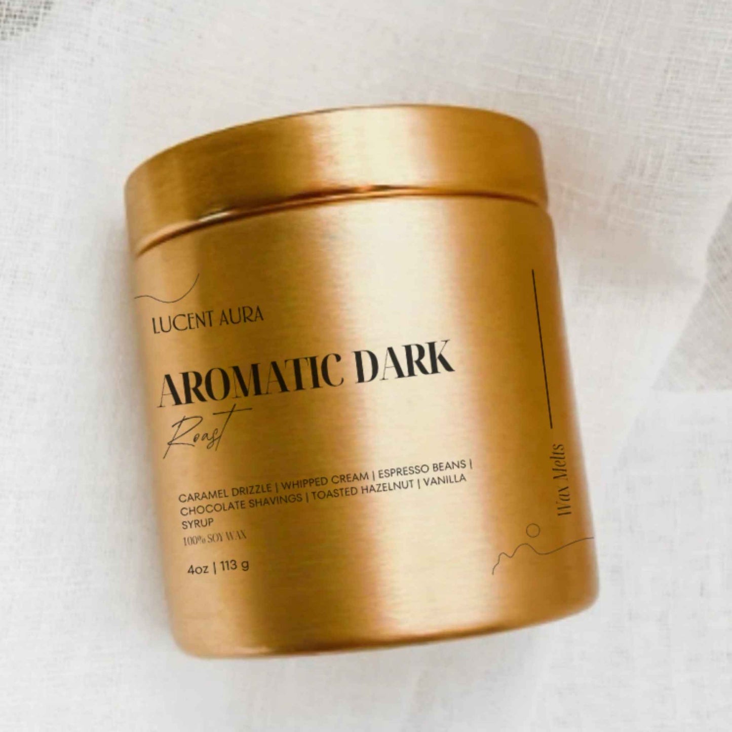 Gold container labeled 'Aromatic Dark' on a white background