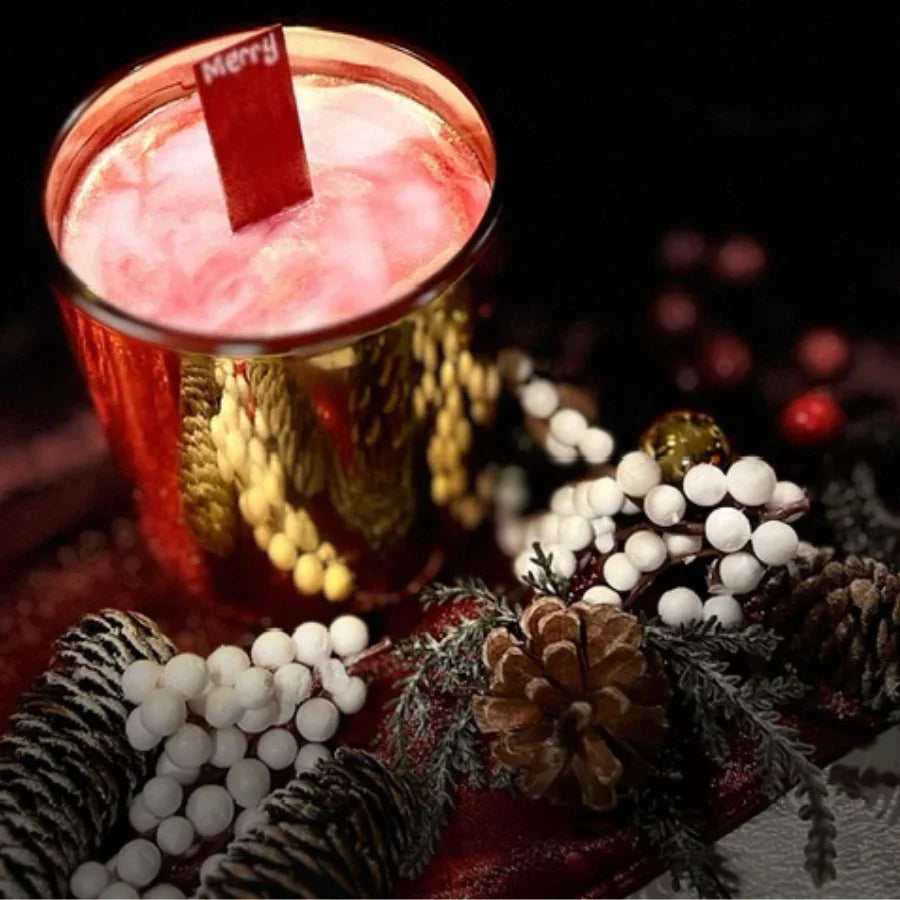 Naughty or Nice Candle in gold vessel with red wick