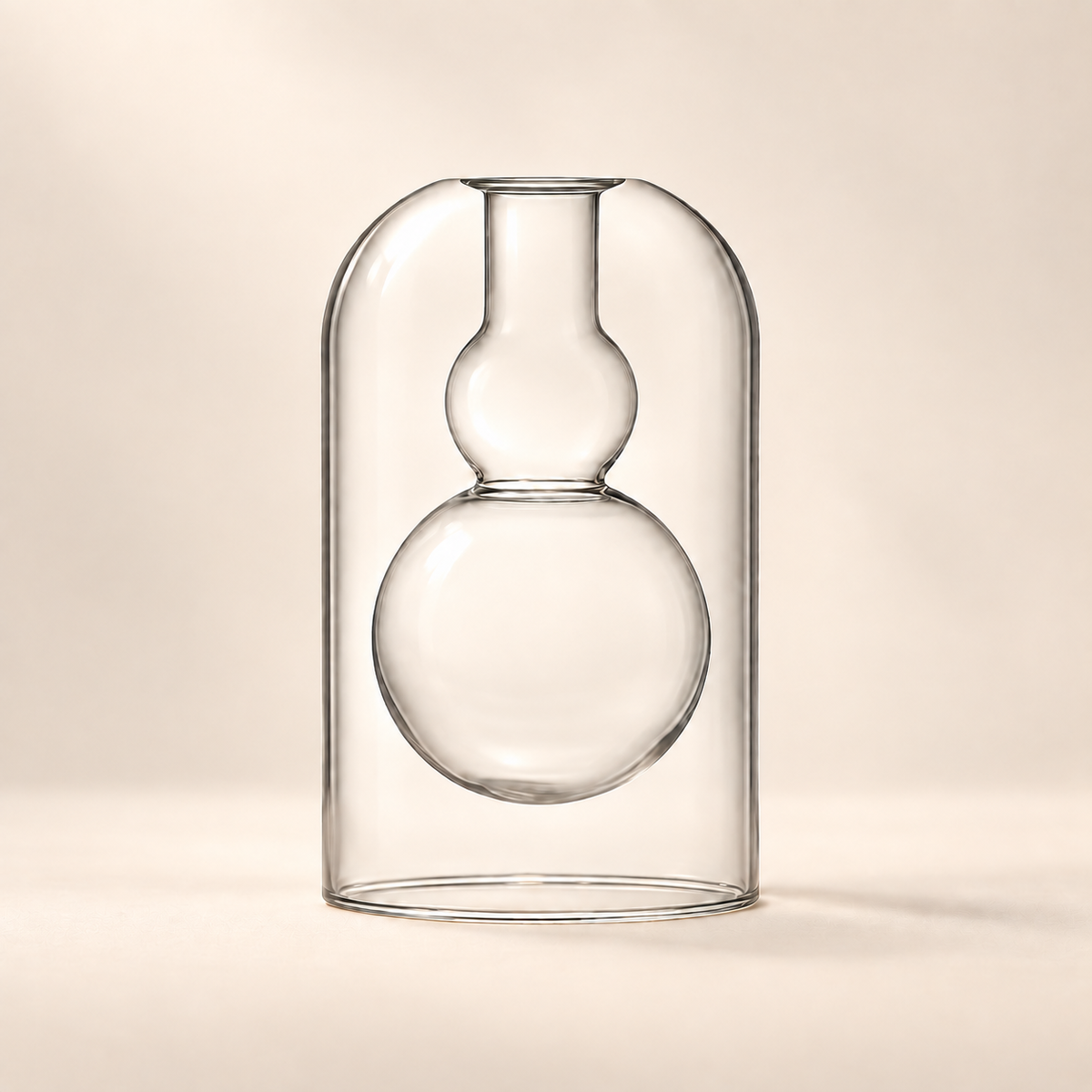 Clear glass double-walled vase with a rounded bulbous body and a short neck, enclosed in a matching clear glass dome-shaped outer cover, set against a warm beige background.