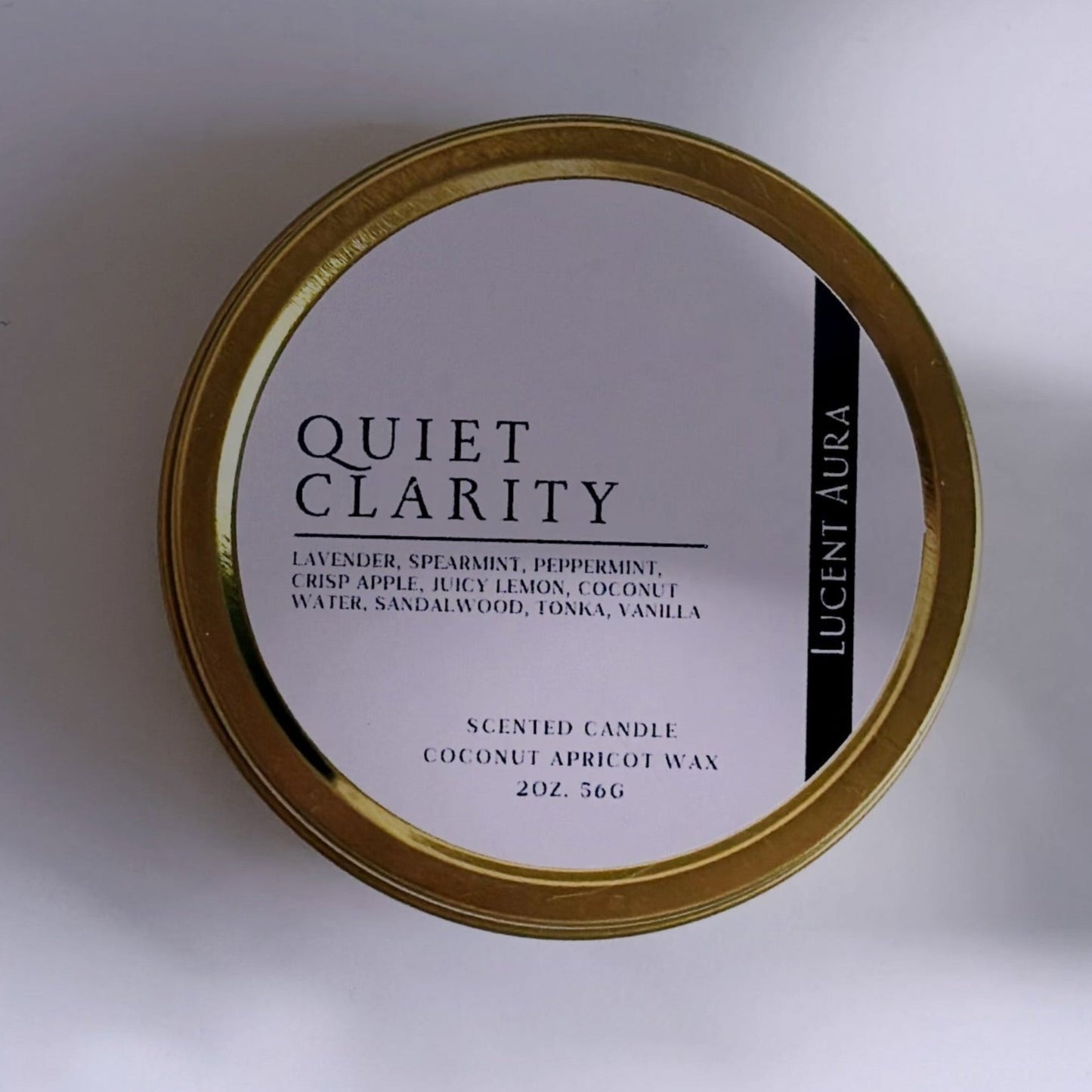 Candle jar labeled 'Quiet Clarity' on a white background 