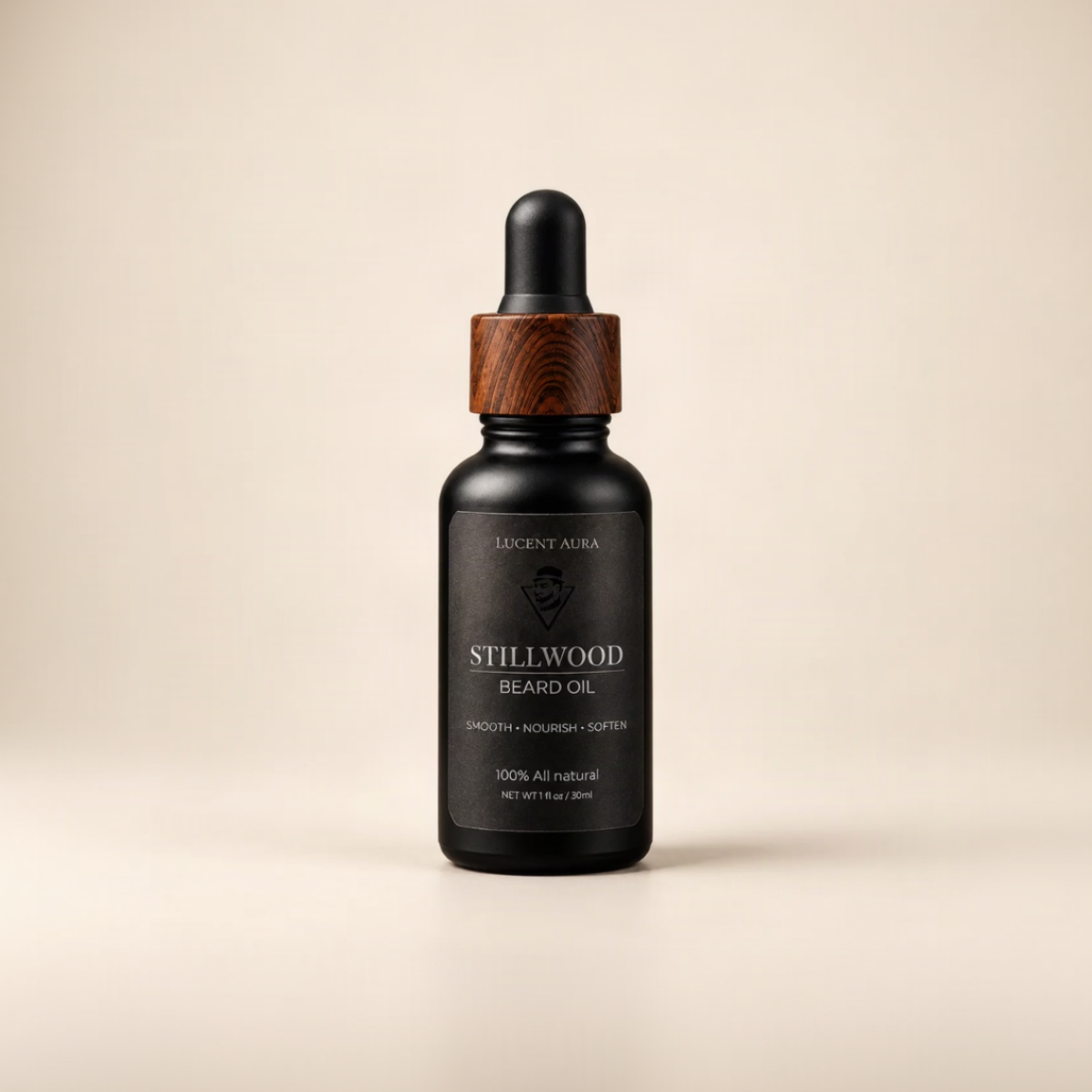 A bottle of Lucent Aura Stillwood Beard Oil with a black dropper cap, a dark wood collar, and a black label, set against a solid beige background.