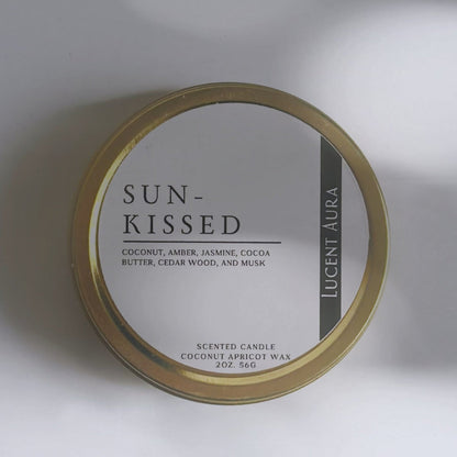 Candle jar labeled 'Sun-Kissed' on a light background in a old tin