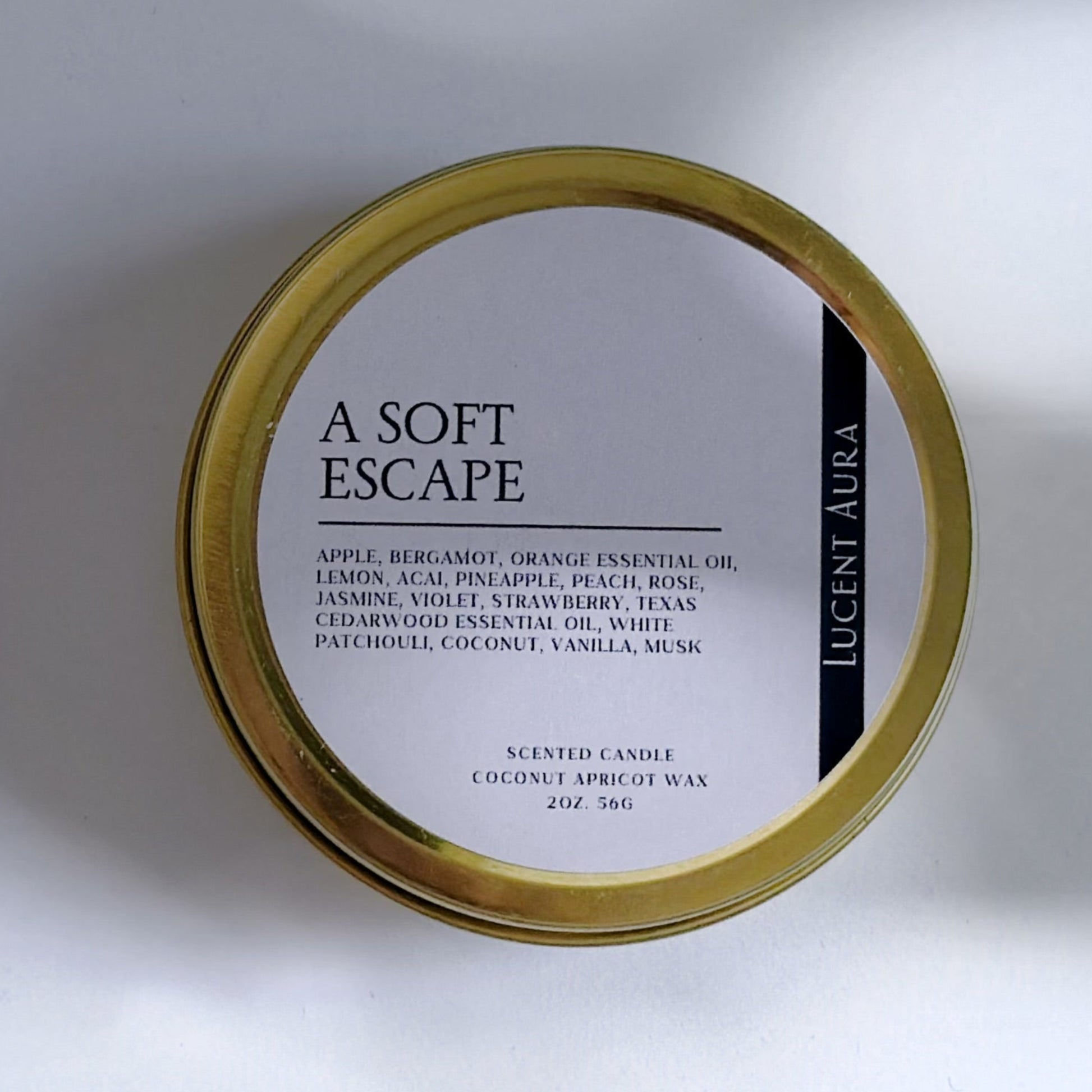 Round container with 'a soft escape' label on a white background
