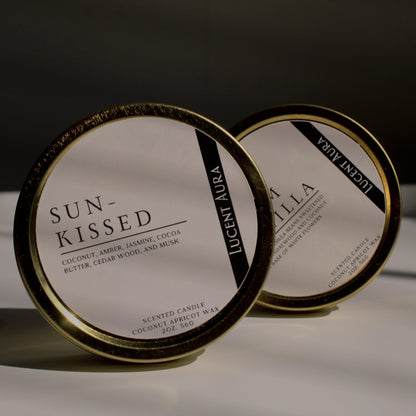 Two scented candle tins 